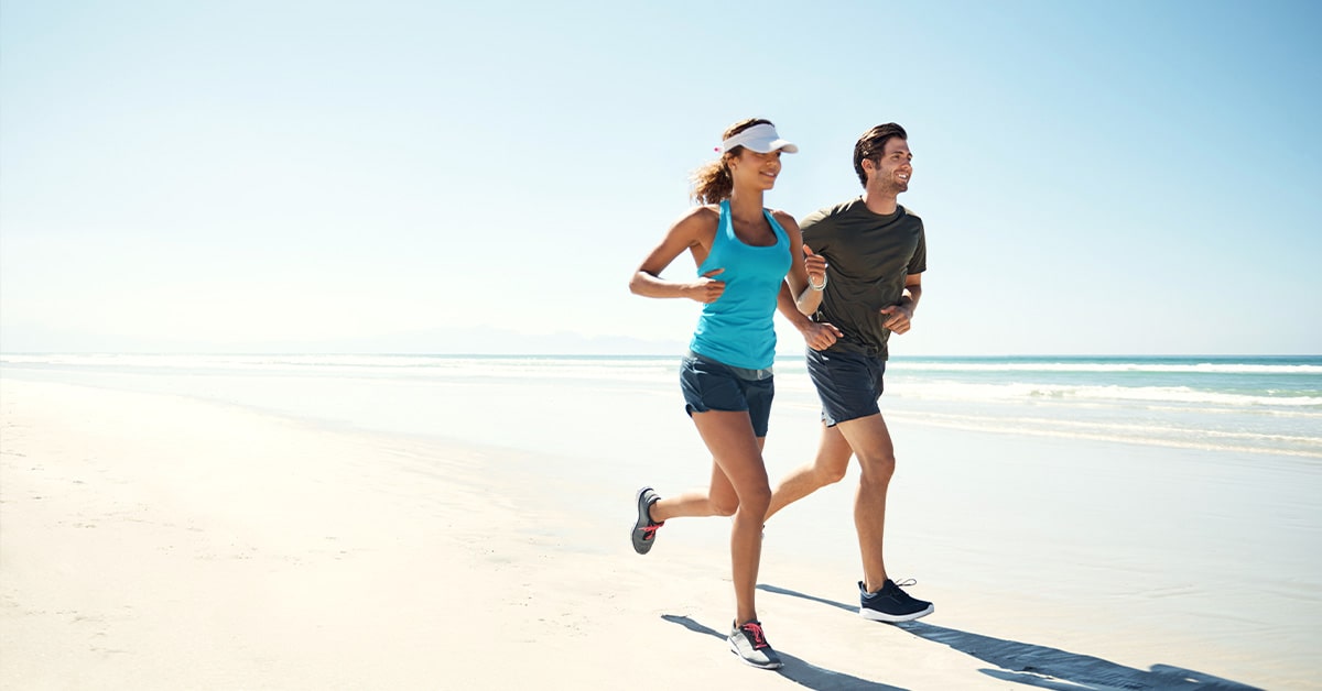 couple running on Florida Beach